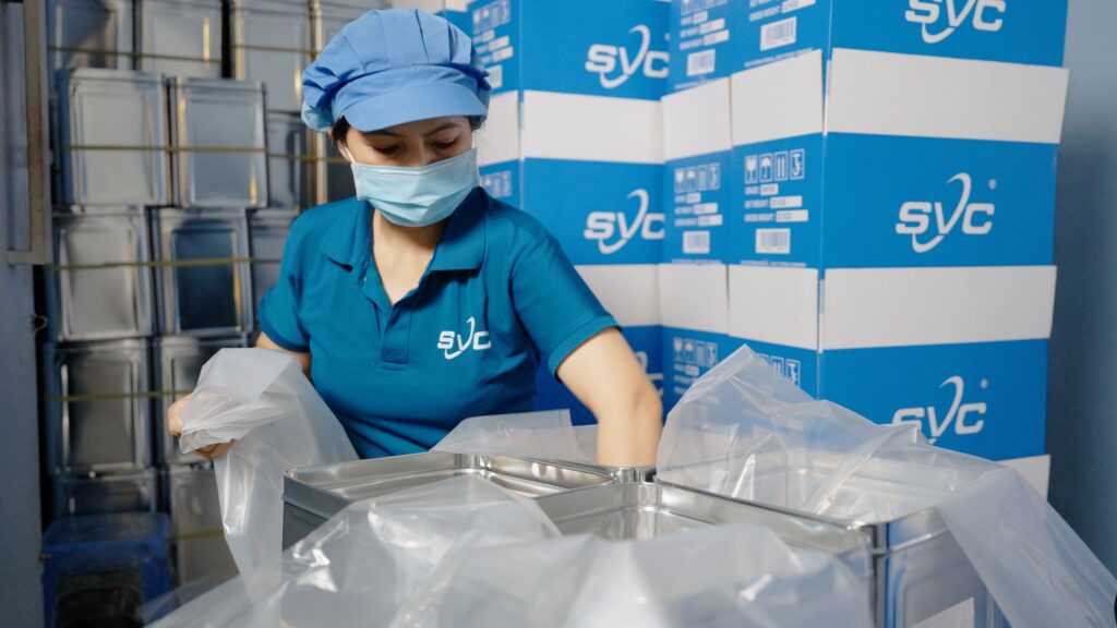 SVC Group 1 SVC team inspecting vacuum-packed cashew kernels